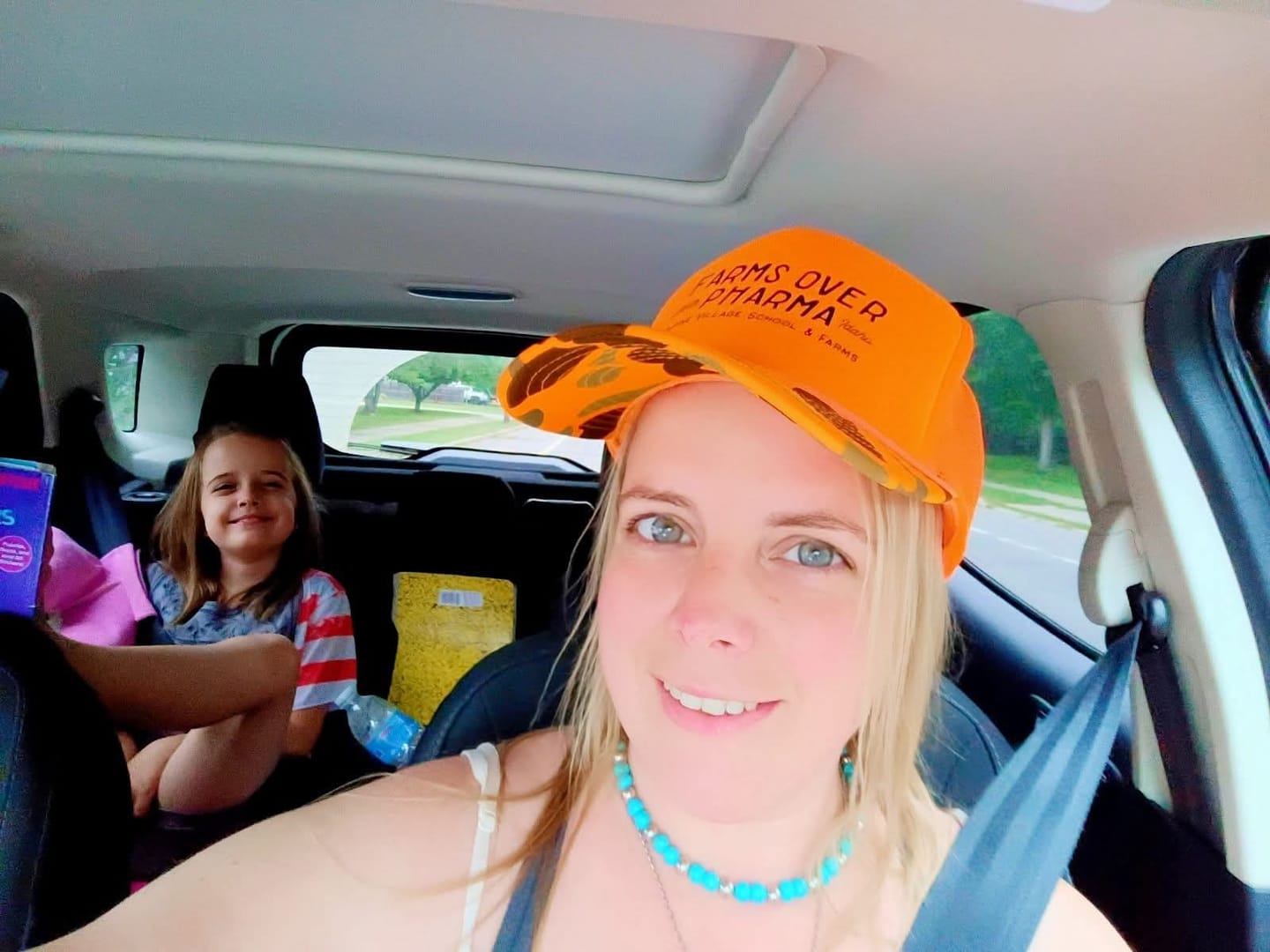 Customer photo review of Farms Over Pharma Trucker Hat (Neon Orange/Camo)