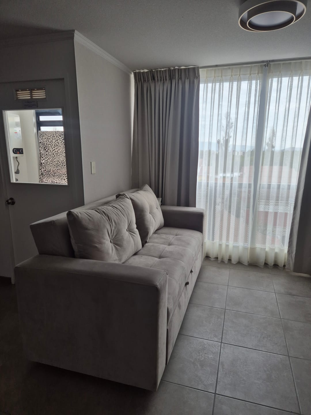 Customer photo review of Set Sofá Cama + Pouf