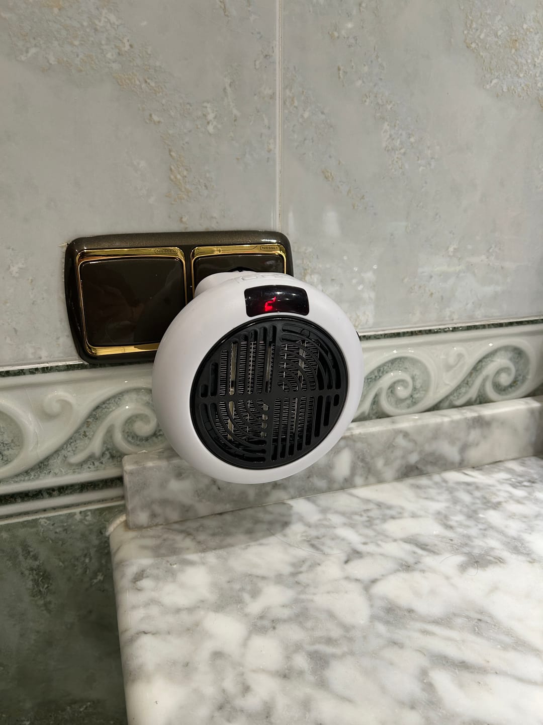 Customer photo review of minicalefactor termocerámico portatil