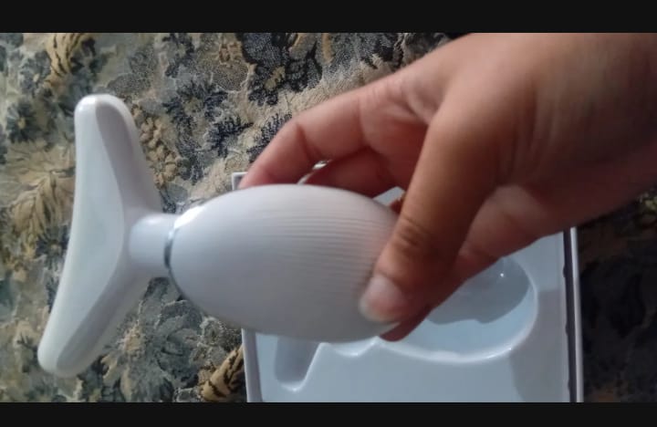 Customer photo review of Face & Neck Lifting Therapy Massager