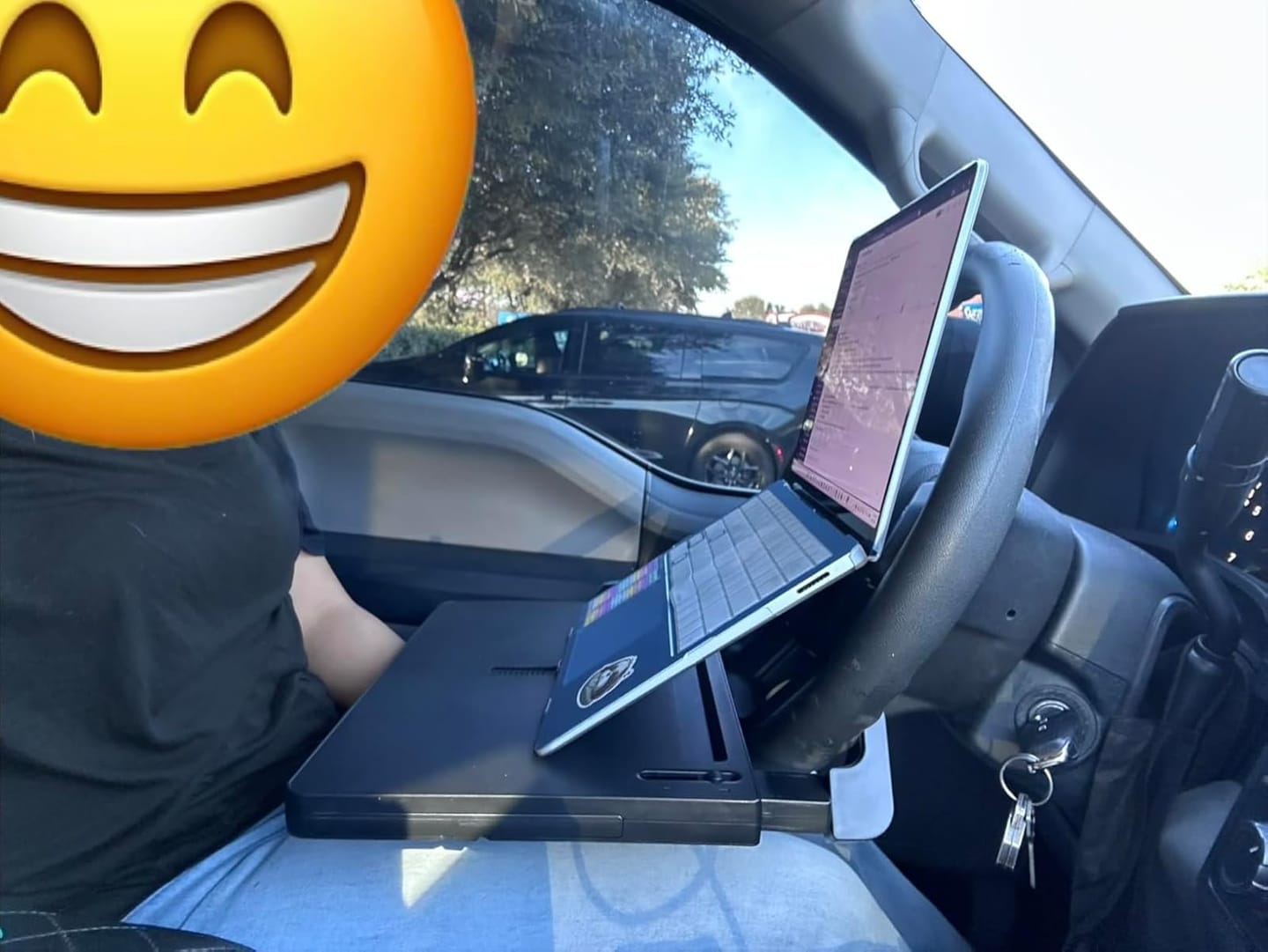 Customer photo review of BOLTHUT™ Folding Backseat Tray Table — Cup & Phone Holder