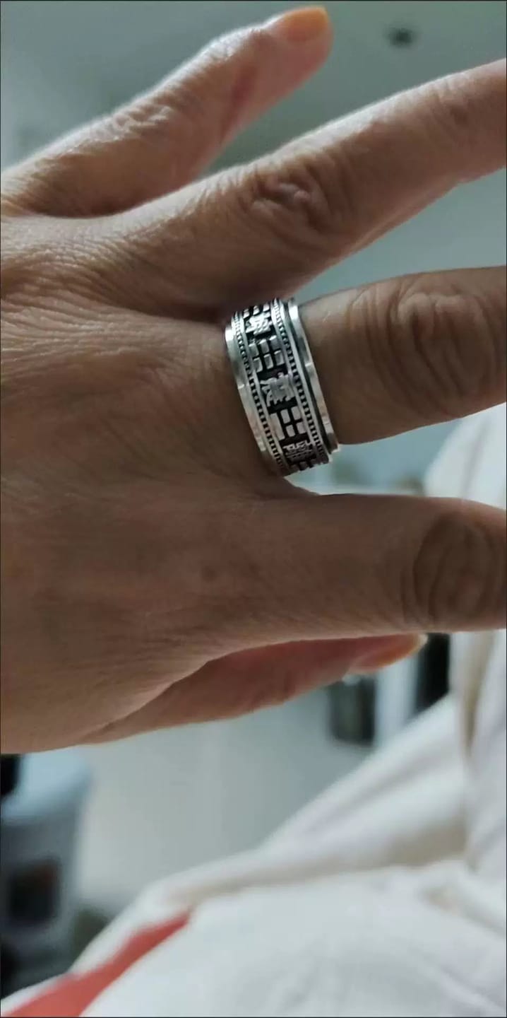 Customer photo review of FuAttract Good Fortune & Harmony Om Mani Mantra Engraved Rotating Ring