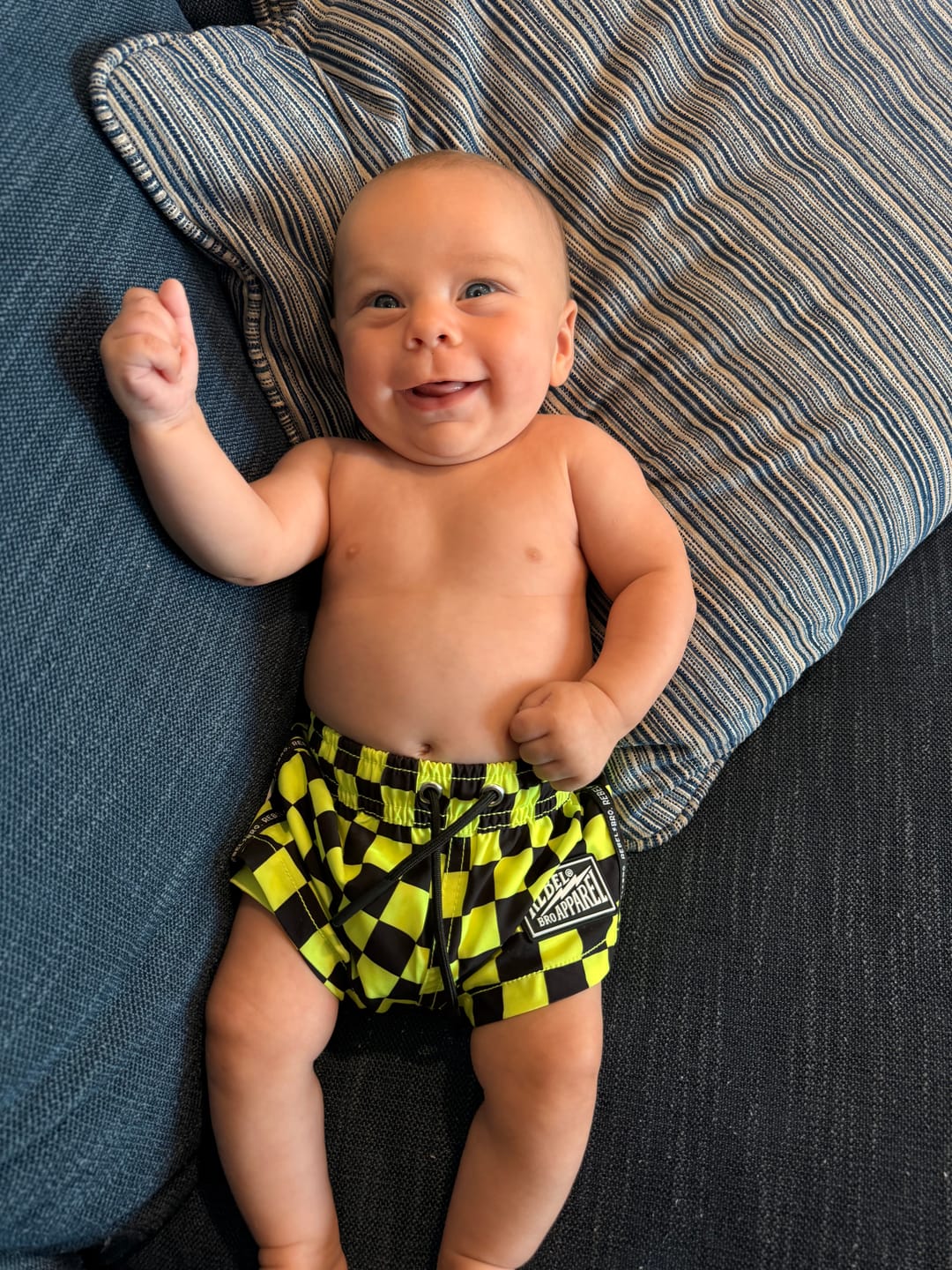 Customer photo review of Hybrid Swim Trunks in Neon Electric Lime + Black Checkered