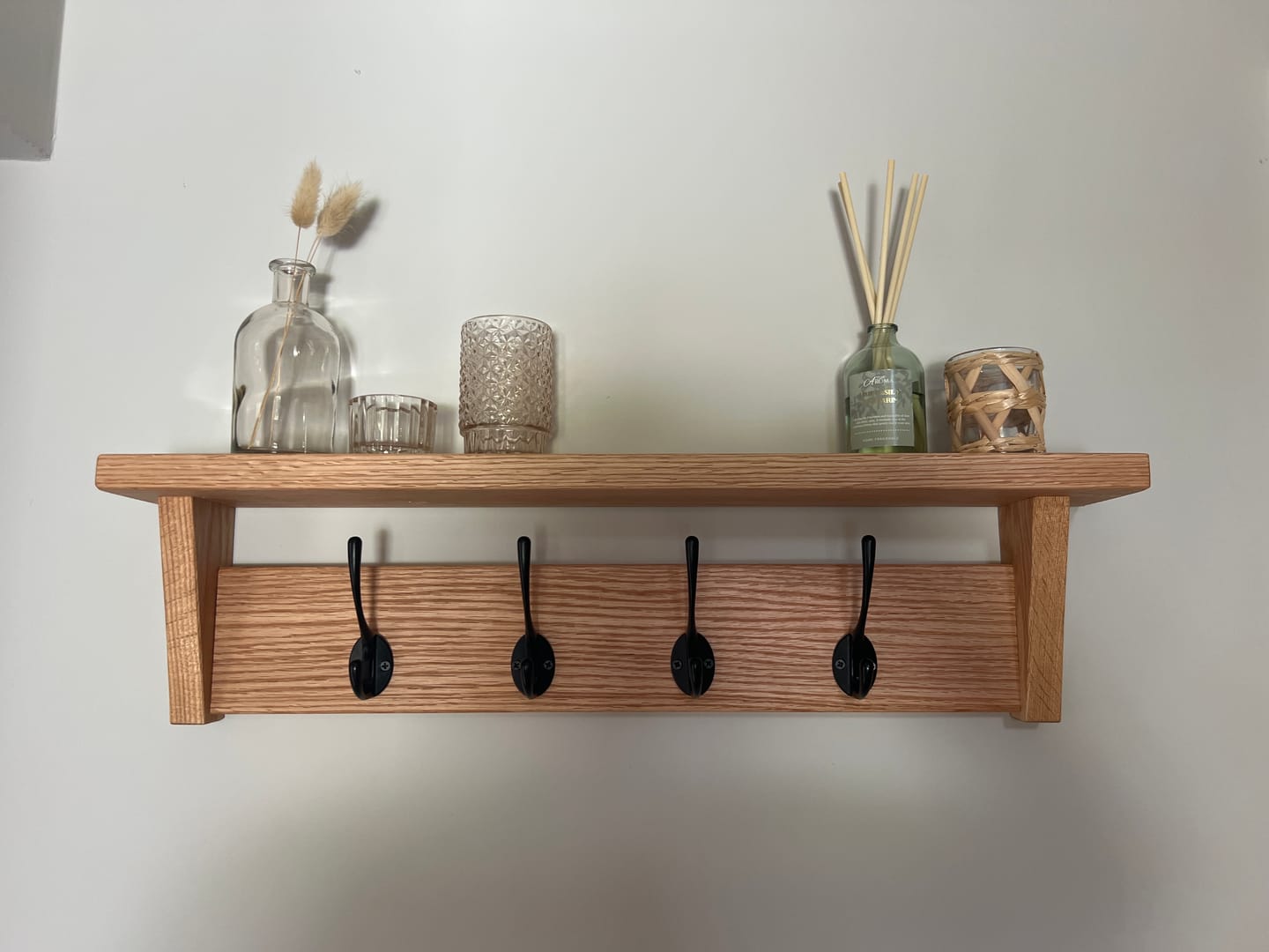 Customer photo review of Oak Coat Hanger