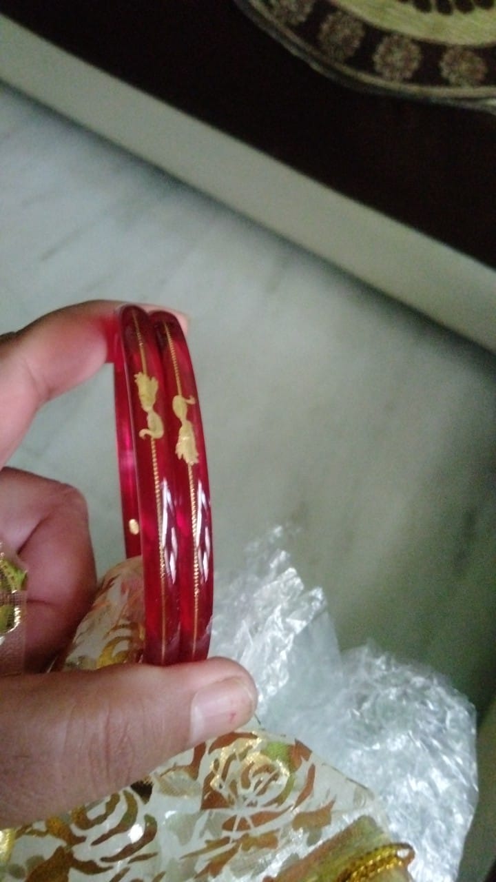 Customer photo review of “Mayur Light Red - A Divya Shringar Bangle” (2 pis) (Transparent Red)