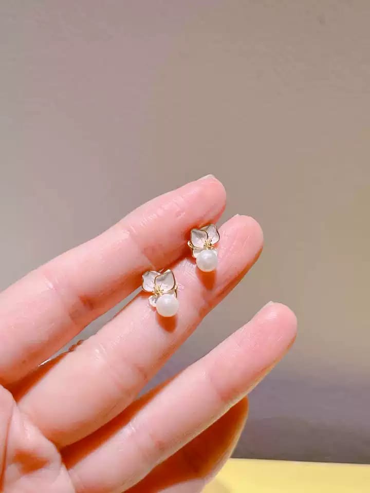 Customer photo review of Odette Mother-of-Pearl Orchid Stud Earrings