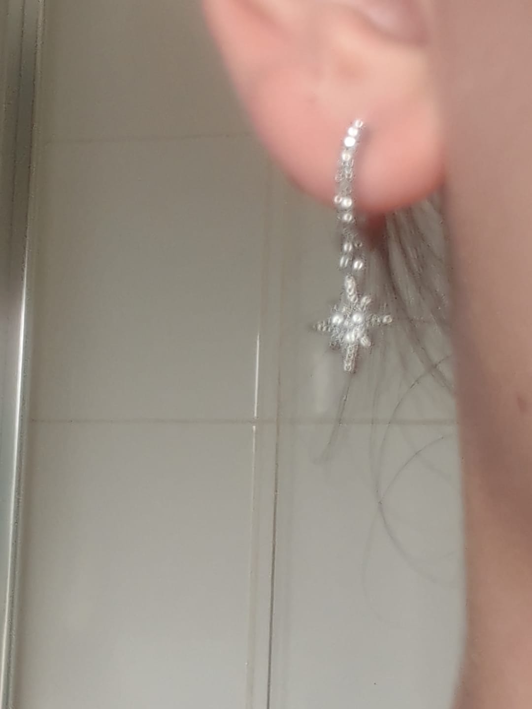 Customer photo review of Cosima Silver Crystal Star Huggie Earrings