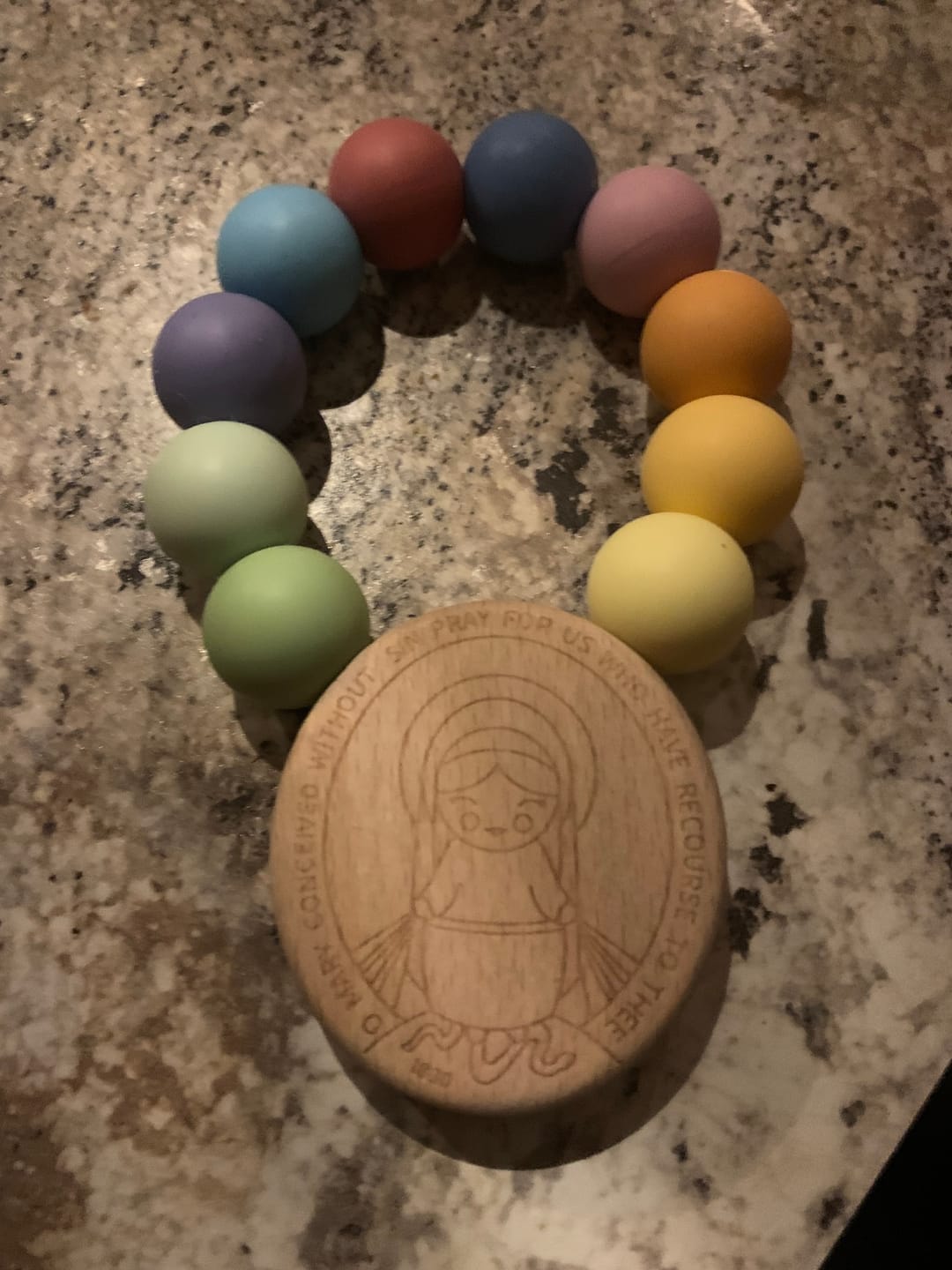 Customer photo review of Baby's First Miraculous Medal Teether - Rainbow of Hope