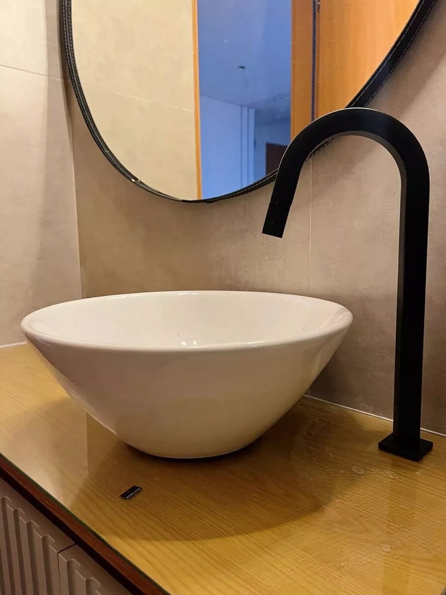Customer photo review of Torneira Para Banheiro Monocomando Bica Alta Elegance