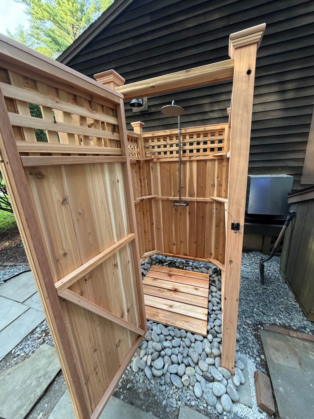 Customer photo review of Wall-Mounted Dual Handle Outdoor Shower Fixture with 10-Inch Rain Head