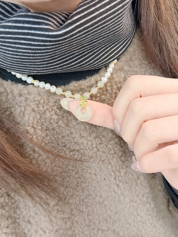 Customer photo review of Vivienne Jade Peace Buckle Pearl Necklace