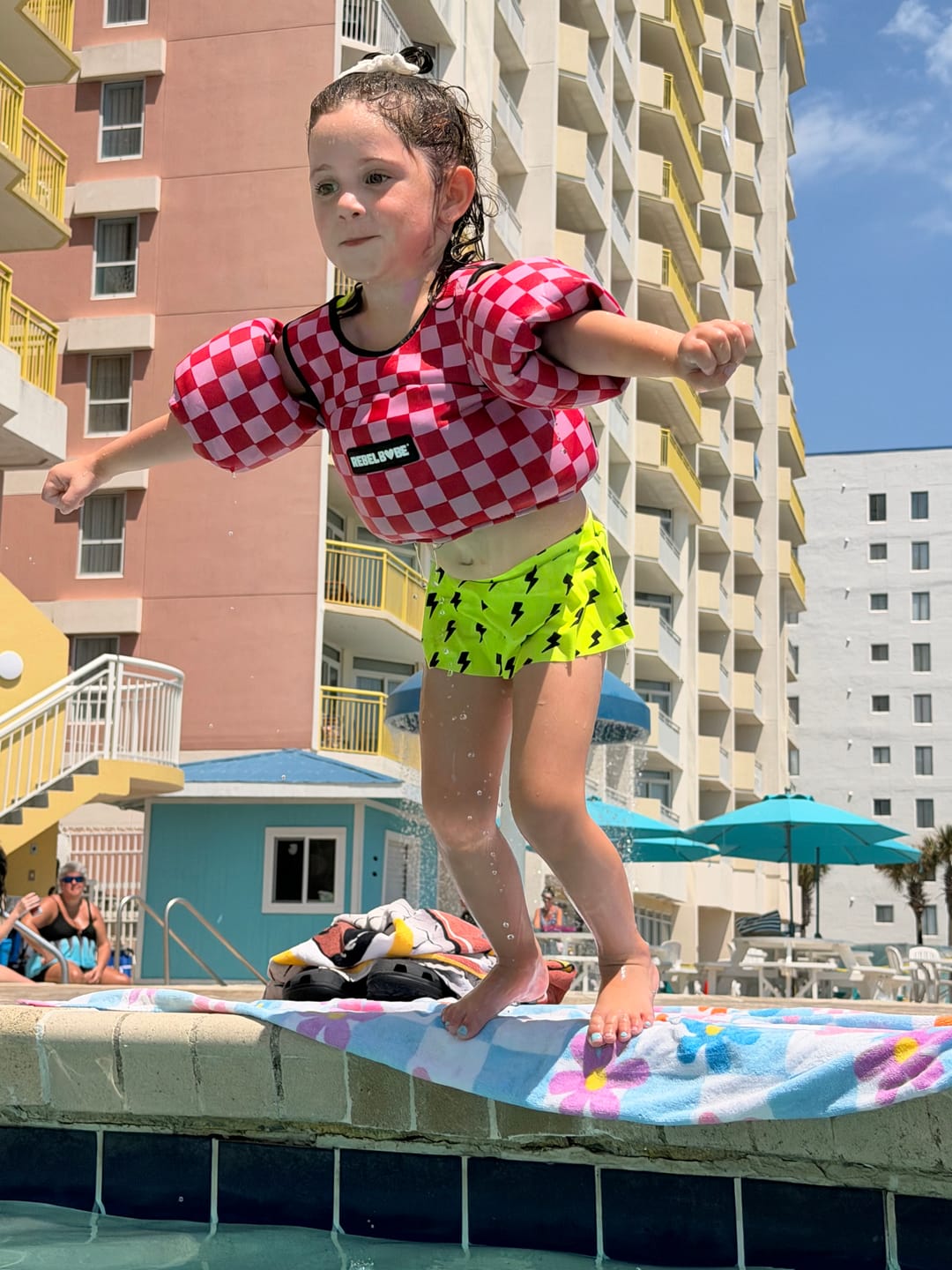 Customer photo review of Neoprene Swim Vest in Bubble Gum Checkered