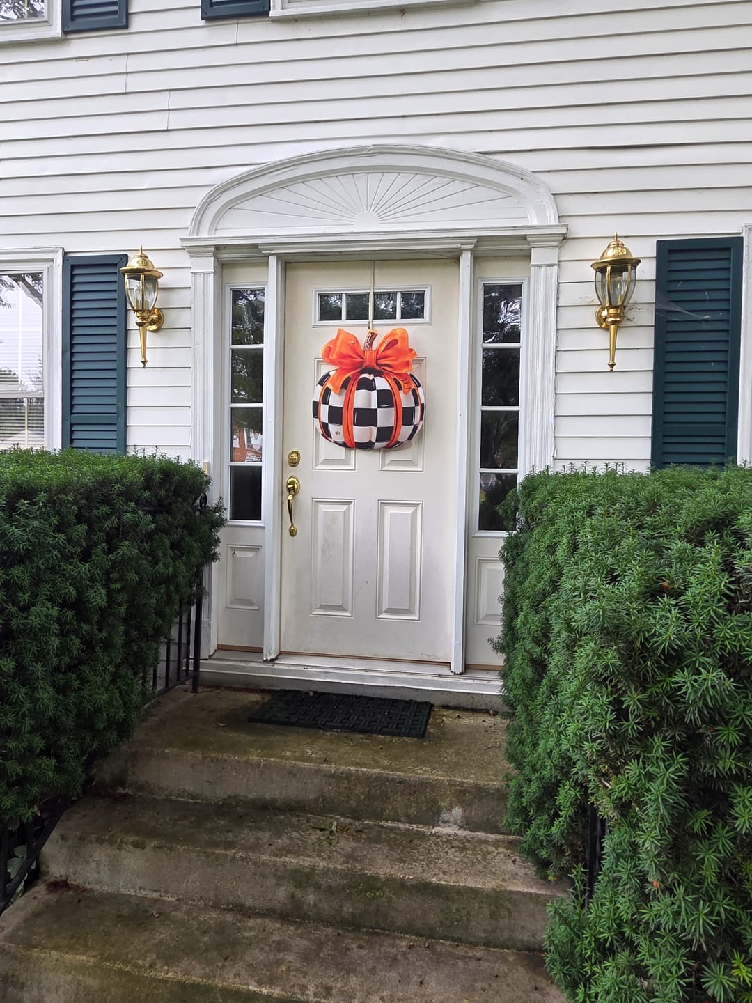 Customer photo review of Elegant Checkered Pumpkin Door Hanger