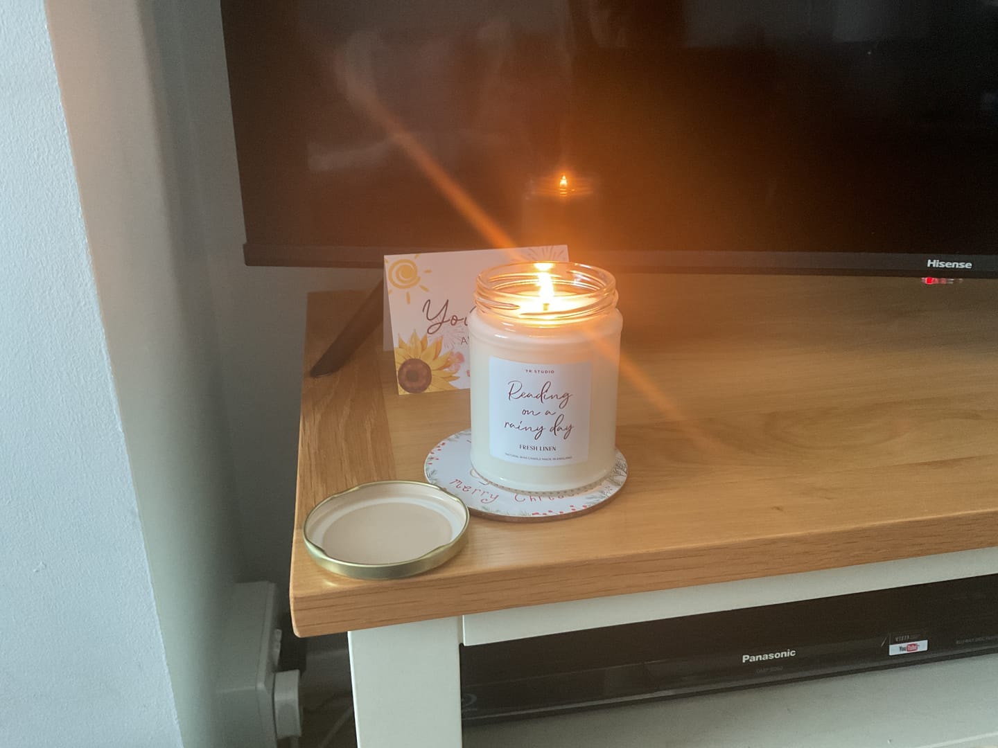 Customer photo review of “Reading On A Rainy Day” Book Candle