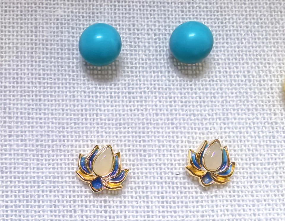 Customer photo review of Nerida Jade Lotus Stud Earrings