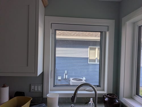 Customer photo review of SmartWings Hardwired Motorized Light Filtering Roller Shades 70% Blackout Essential