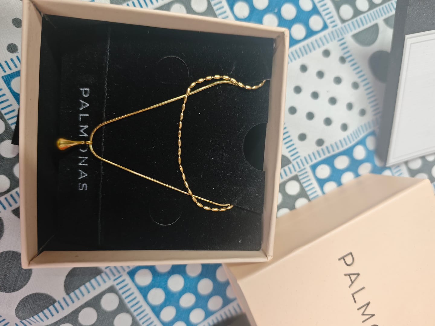 Customer photo review of Sleek Teardrop Charm Layer Necklace