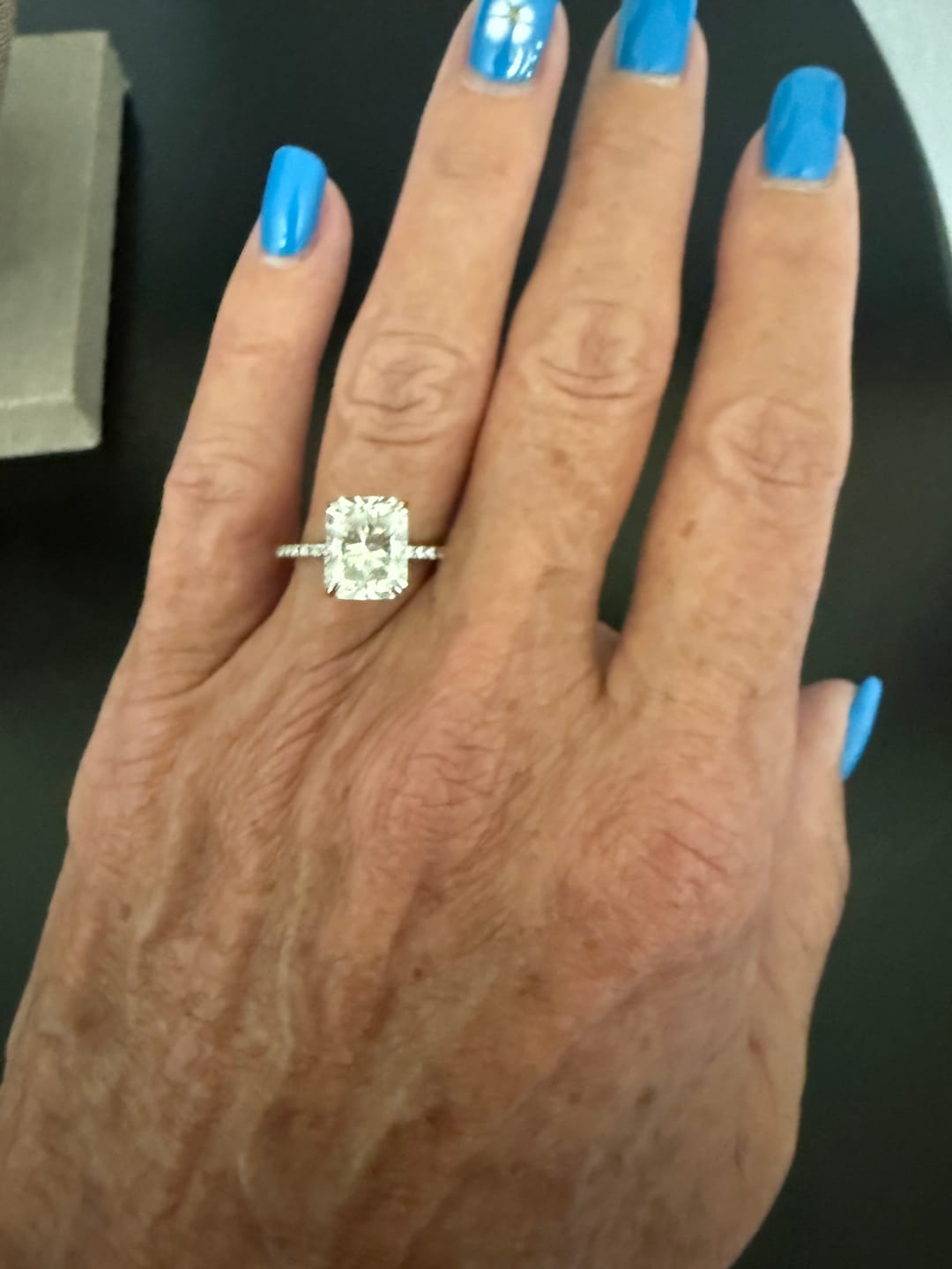 Customer photo review of Solarii Moissanite 4.0ct Hidden Halo Radiant Cut  925 Sterling Silver Engagement Ring