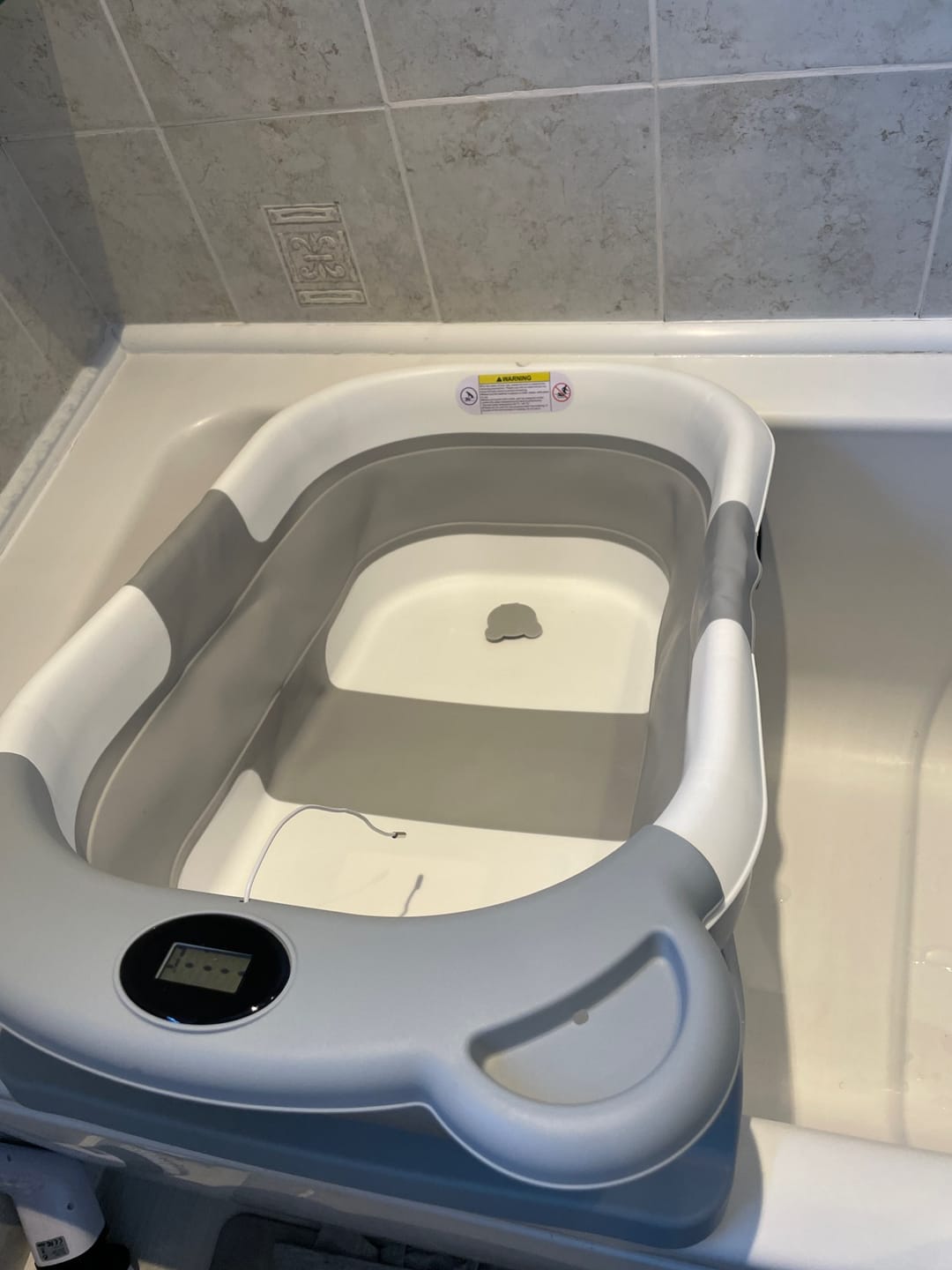 Customer photo review of Foldable Baby Bath Tub with Temperature Display