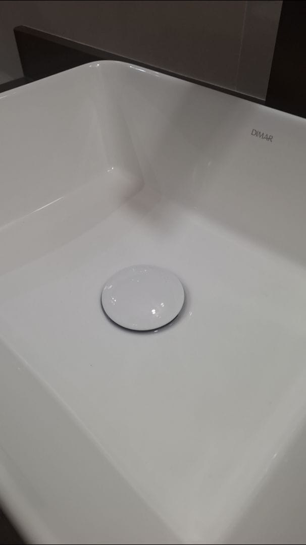 Customer photo review of Válvula Click Banheiro Aço Inox 201 Acabamento Em Cerâmica Branca