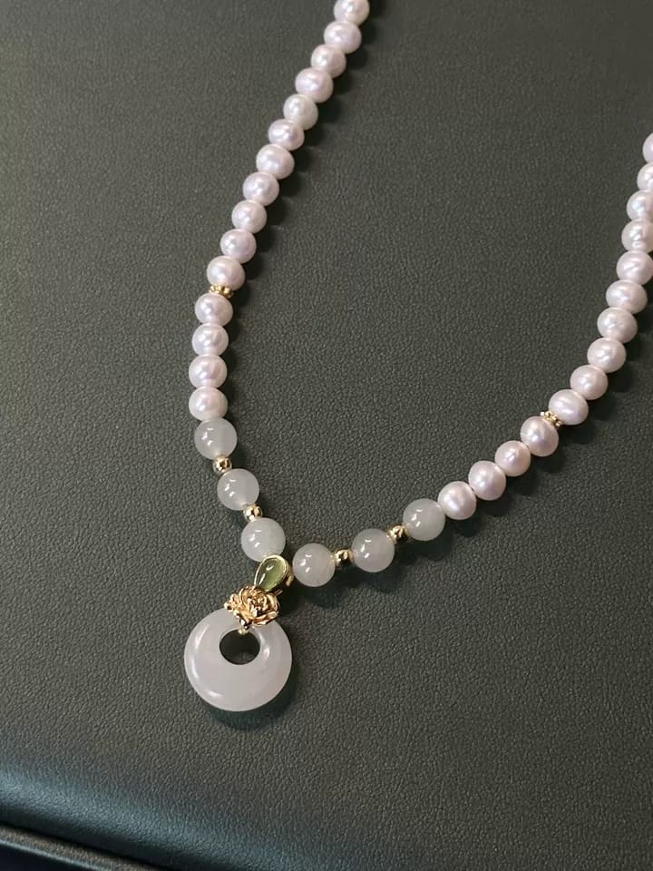 Customer photo review of Vivienne Jade Peace Buckle Pearl Necklace