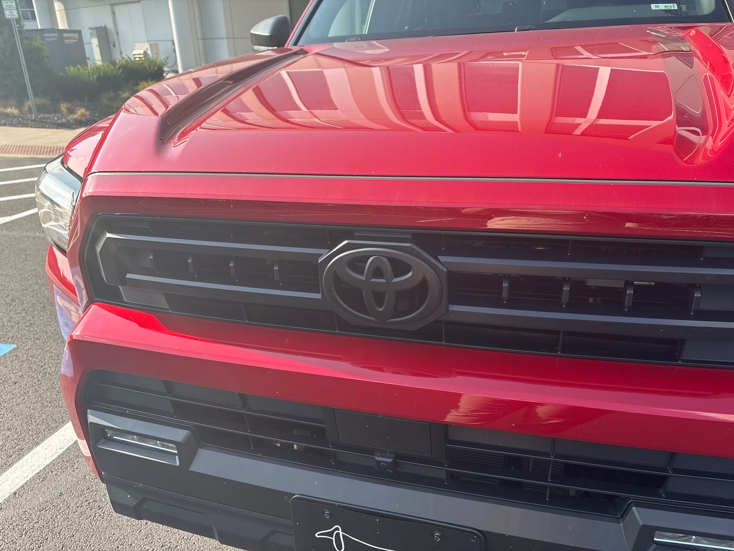 Customer photo review of NEW 2025-2026 4Runner Matte Blackout Overlay Front Grille Emblem