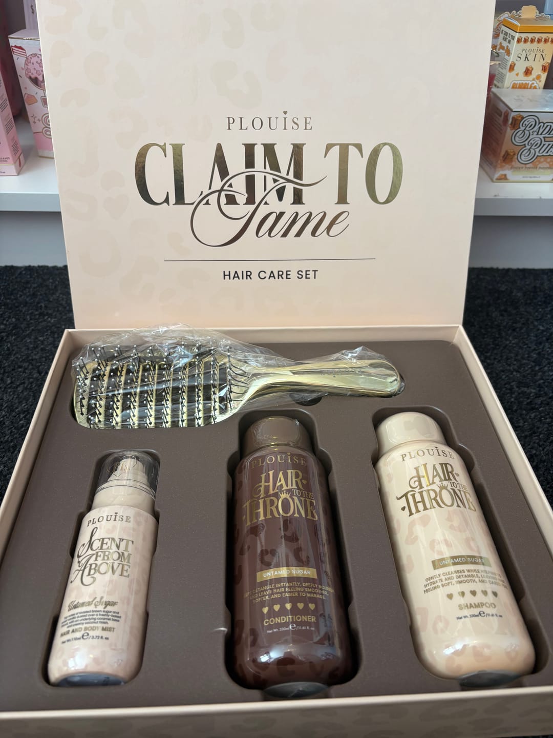 Customer photo review of Cheetah Claim To Tame Hair Care Set