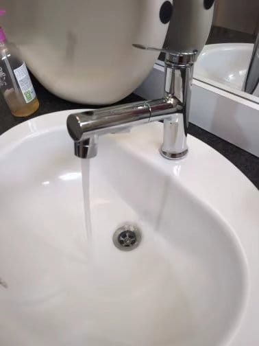 Customer photo review of Torneira Para Banheiro Monocomando Misturador 3 Funções Com Bica Extensível Inox 304