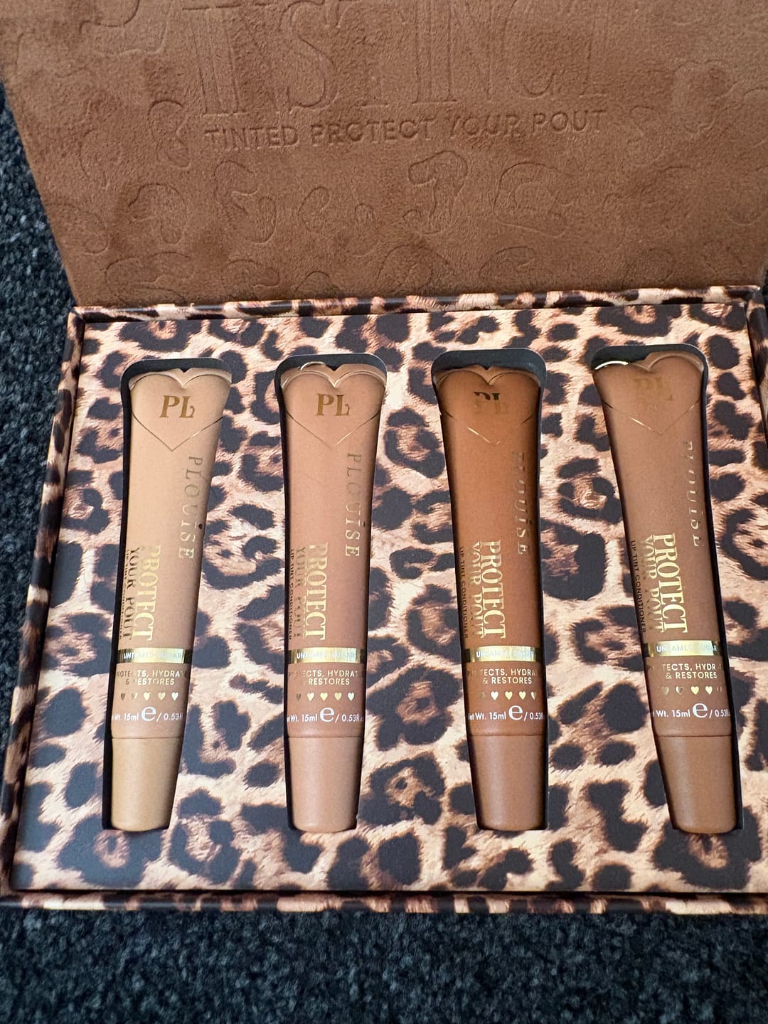 Customer photo review of Wild Instincts Cheetah Tinted Lip Conditioner Set