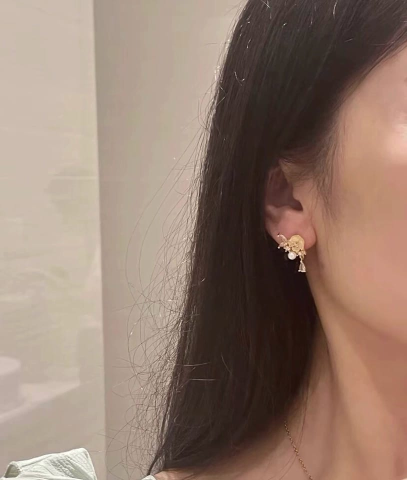 Customer photo review of Colette Pearl Camellia Stud Earrings