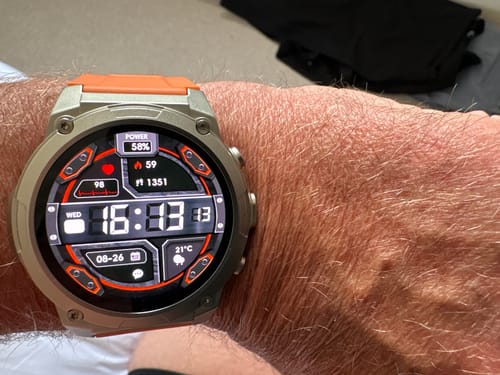 Customer's Gard Pro Ultra 3 watch with an orange strap, worn on a wrist showing a digital face display.