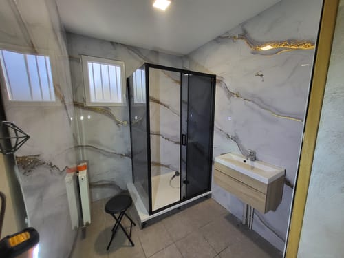 Customer photo review of Panneau Mural PVC Effet Marbre Doré – Étanche et facile à poser