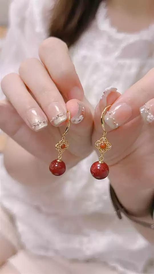 Customer photo review of Rosalind Cinnabar Clover Drop Earrings