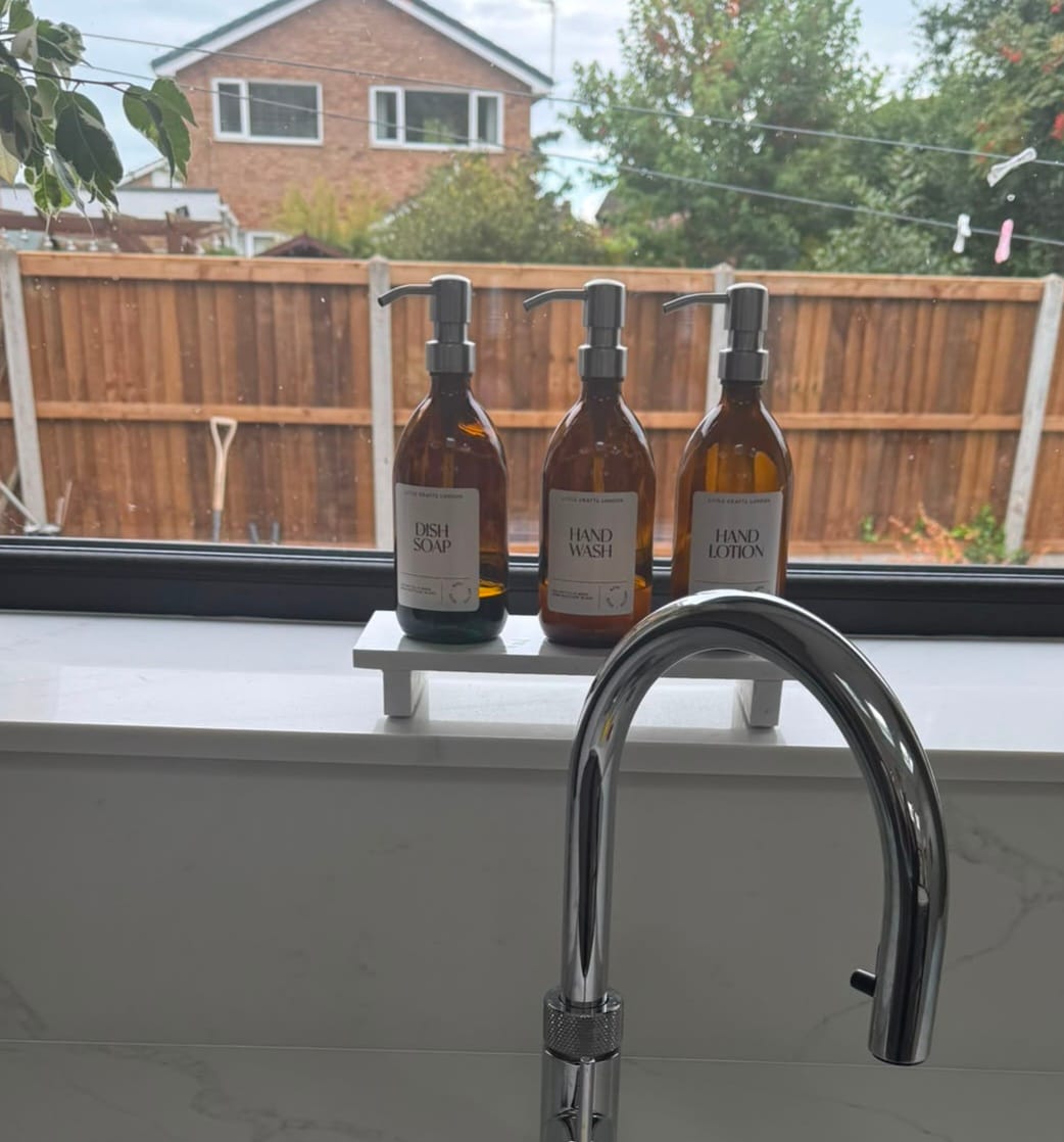 Customer photo review of Set of 3 Reusable Amber Glass Bottles 500 ML with Metal Pump and Long Tray