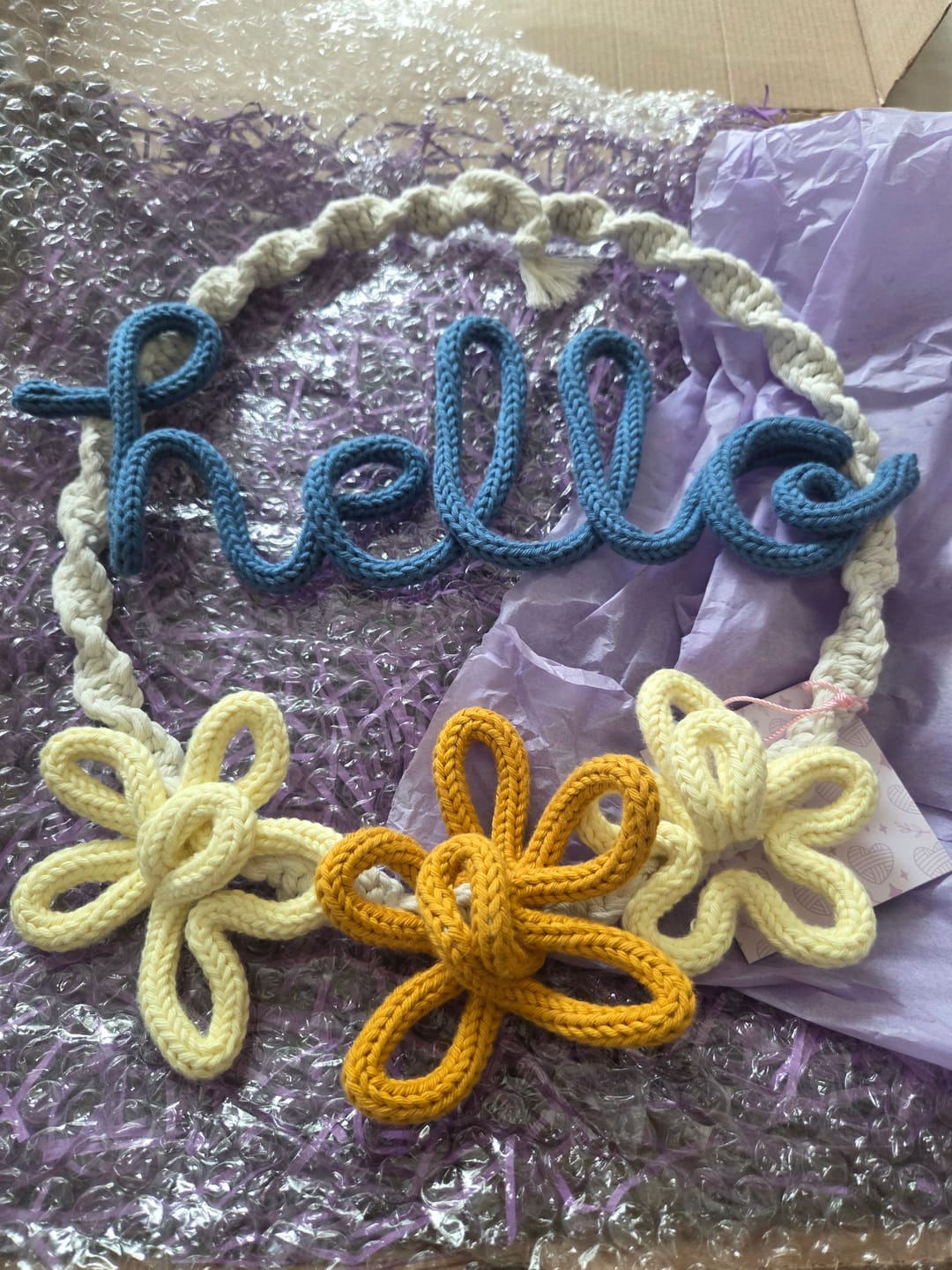 Customer photo review of Macrame Hello Wreath with Knitted Wire Art & 3 Daisy Flowers