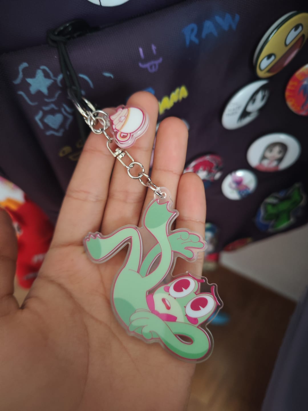 Customer photo review of Ribbit Acrylic Keychain