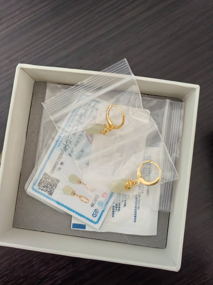 Customer photo review of Seraphine Jade Teardrop Huggie Earrings