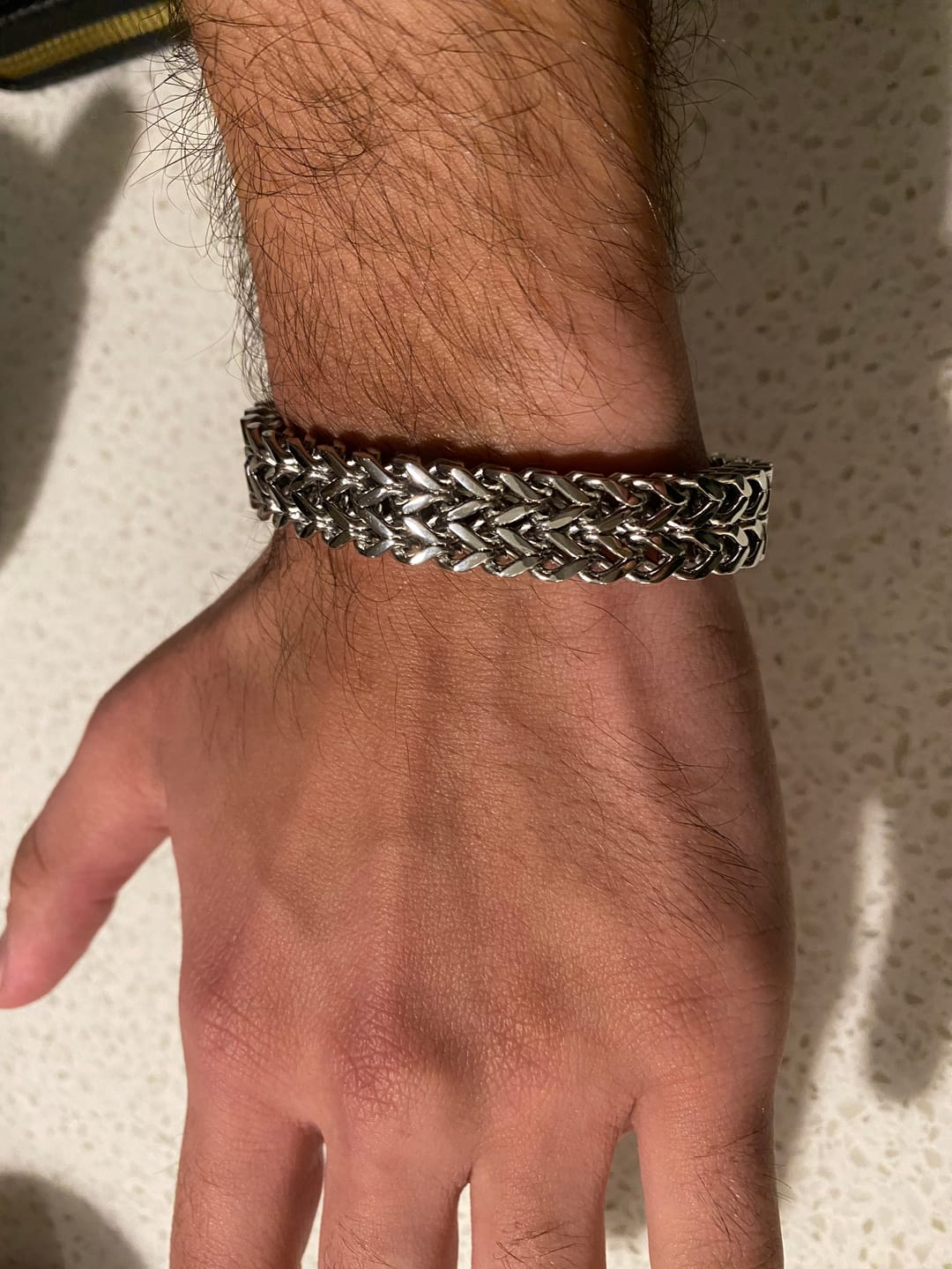 Customer photo review of TitanWeave Custom Engraved Chain Bracelet