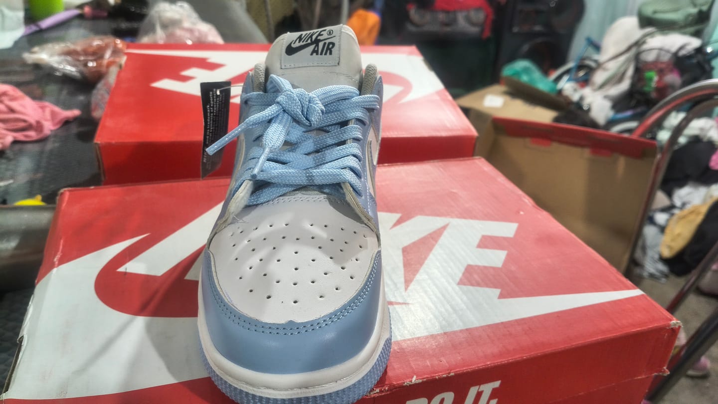 Customer photo review of Tenis Dunk Low Blanco Cielo