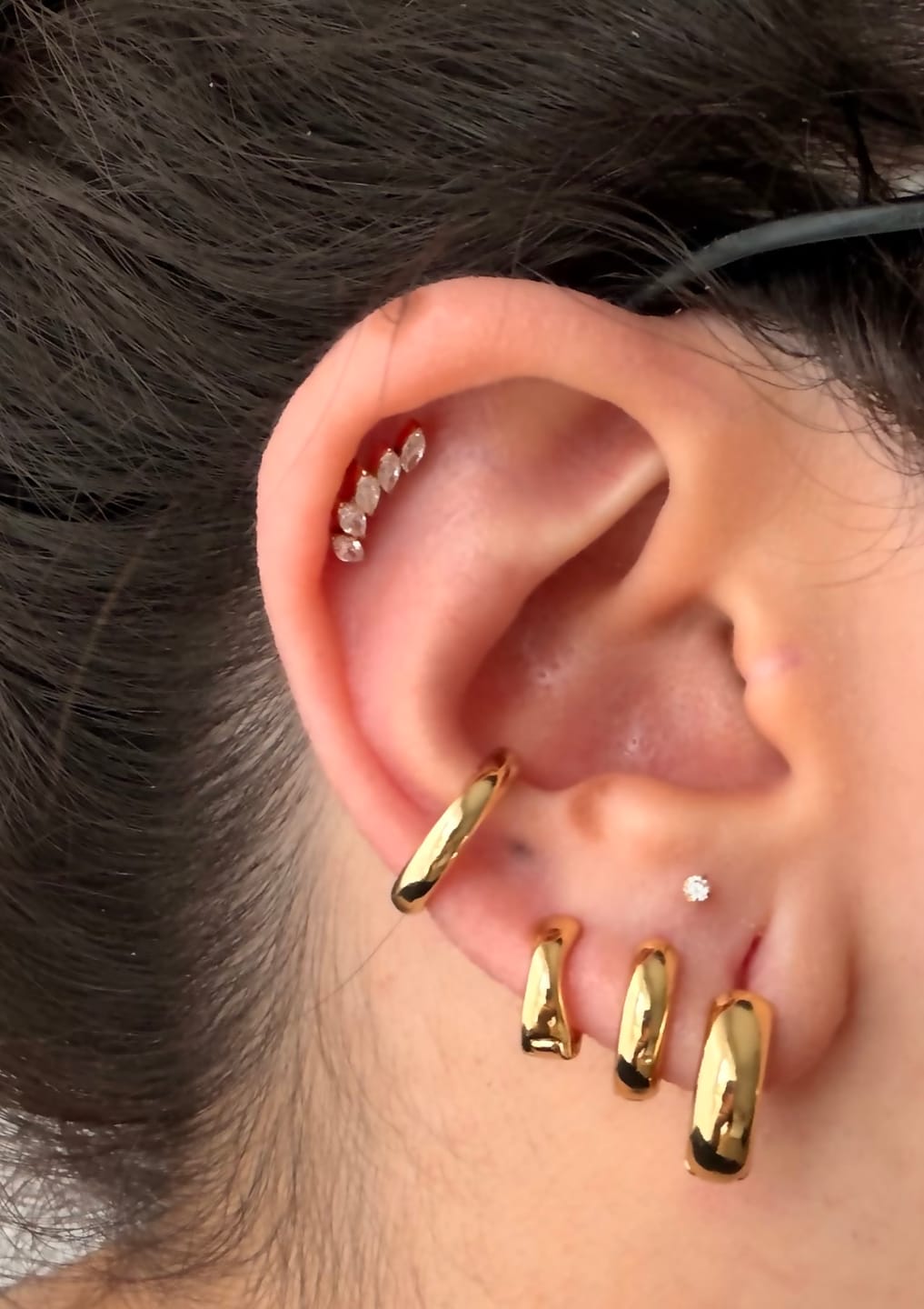 Customer photo review of Feather Piercing | Titan