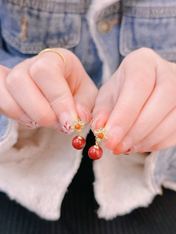 Customer photo review of Rosalind Cinnabar Clover Stud Earrings