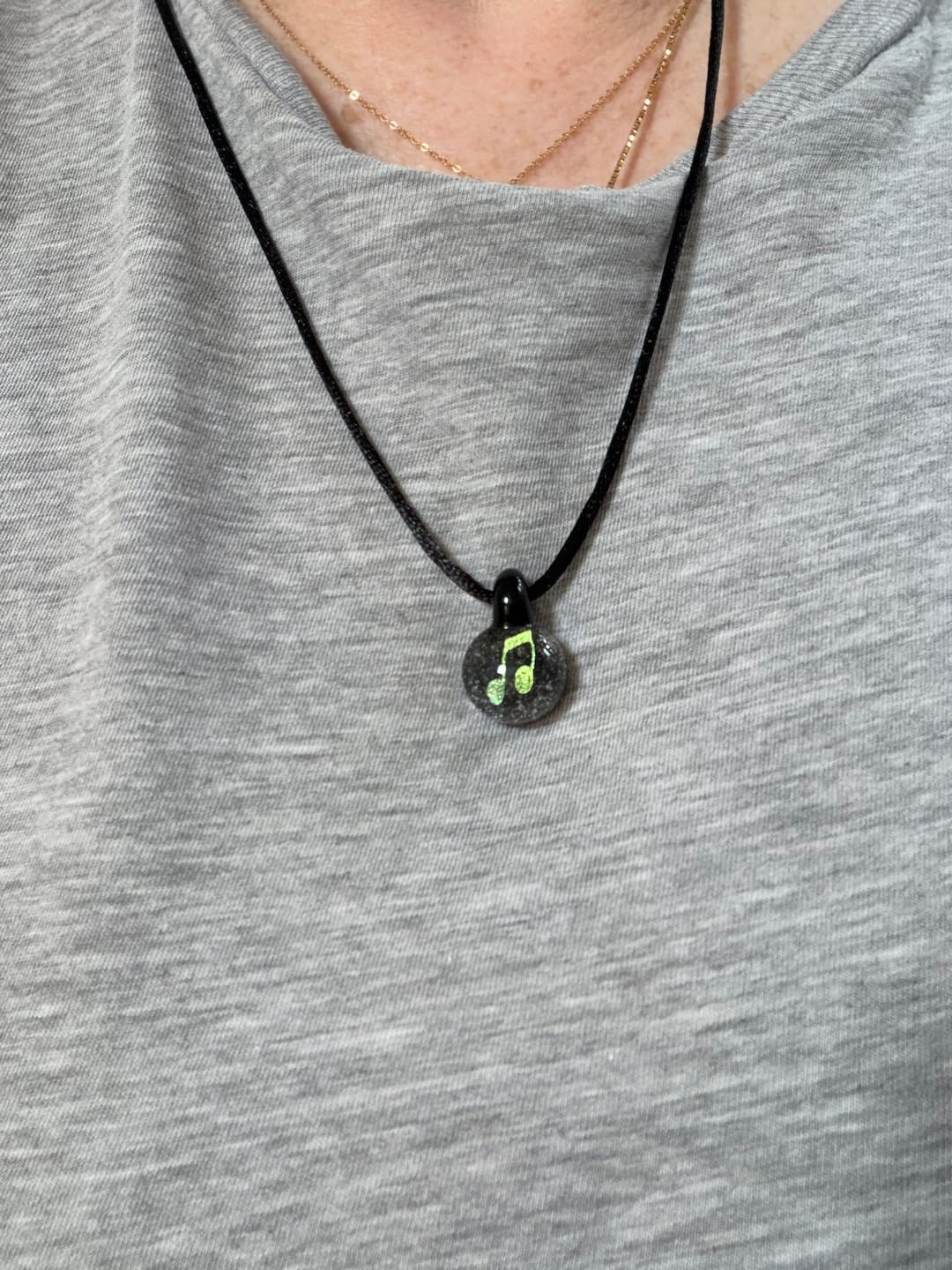 Customer photo review of Music Note Hologram Pendant with Infused Cremation Ash