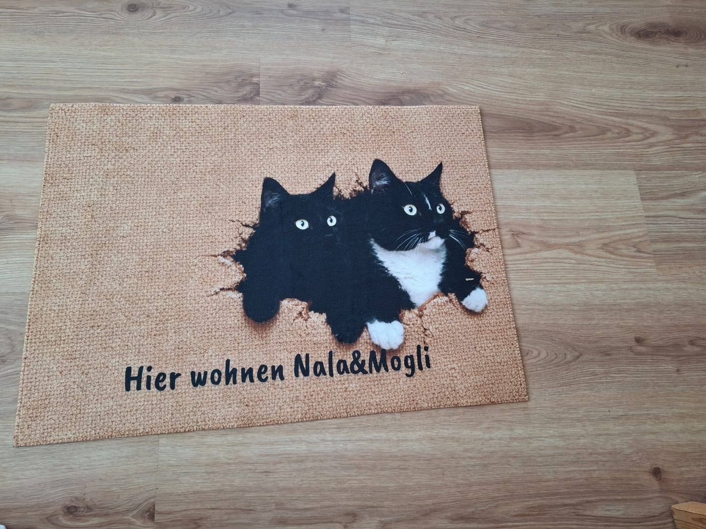 Customer photo review of Personalisierte Fußmatte - Durchbruch