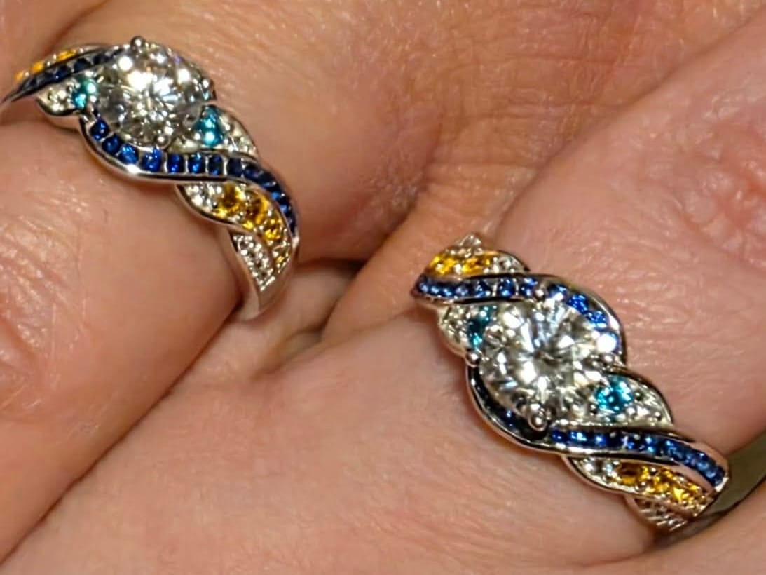 Customer photo review of Starry Night Moissanite Artistic Swirl Accent Engagement Ring