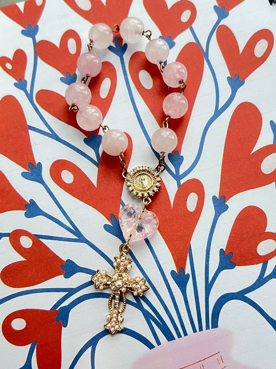 Customer photo review of SolaceBeads Artisan Rose Quartz Pocket Rosary: Soft Pink Beads with Sacred Cross & Marian Accents