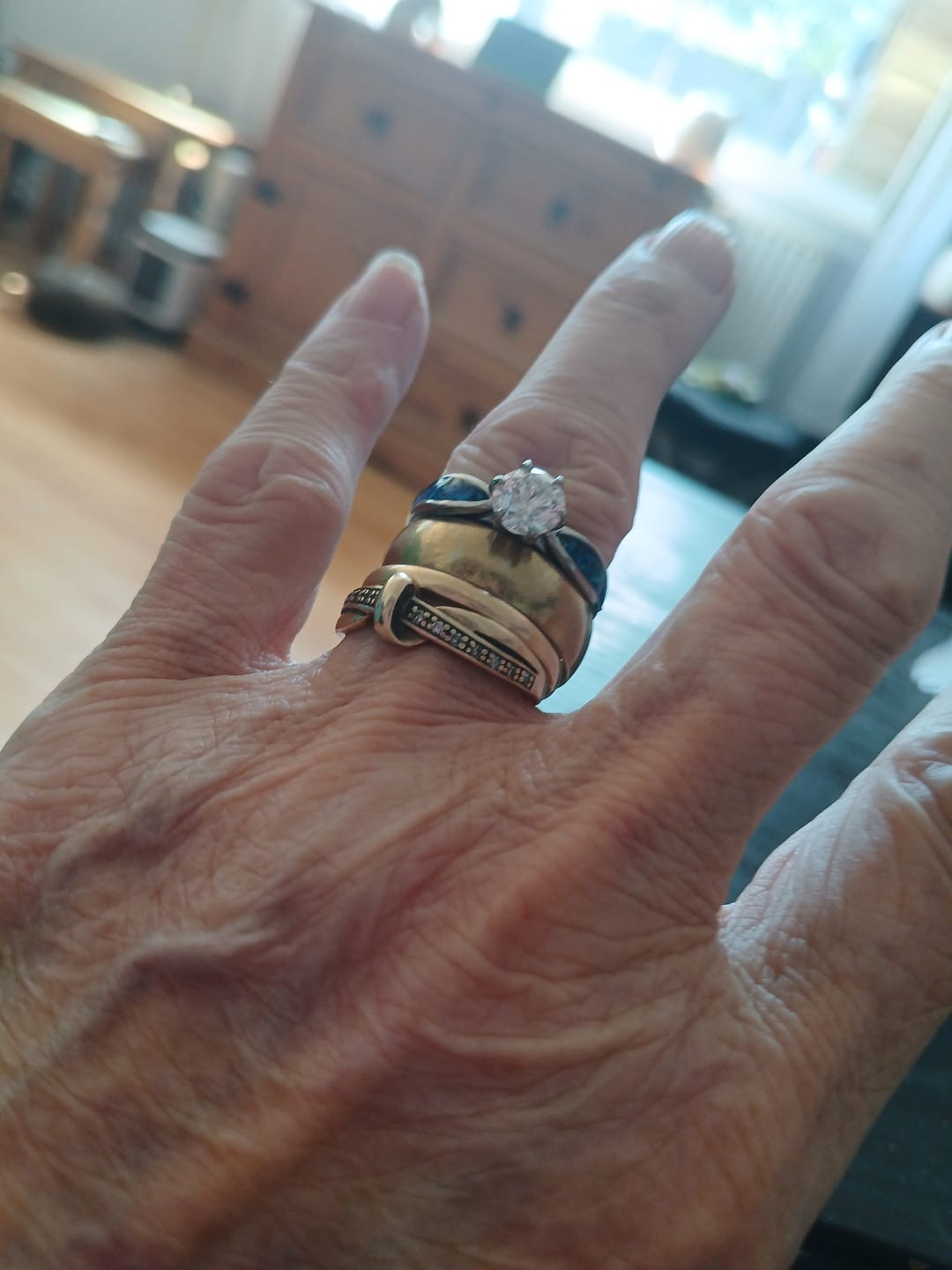 Customer photo review of Forever Yours Stainless Steel Solitaire Ring, suitable for 2 sets of ashes.