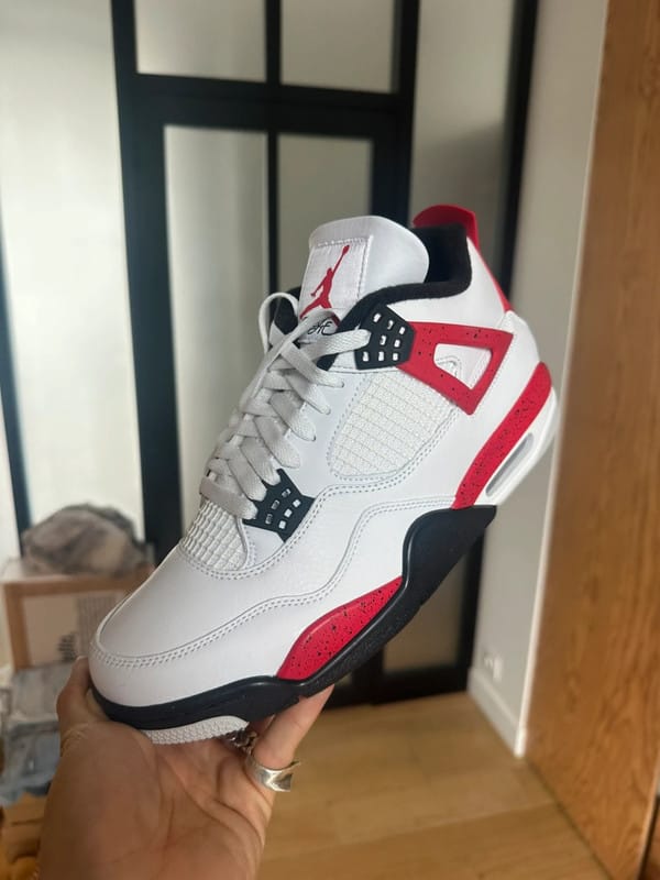 Customer photo review of Jordan 4 Retro Red Cement