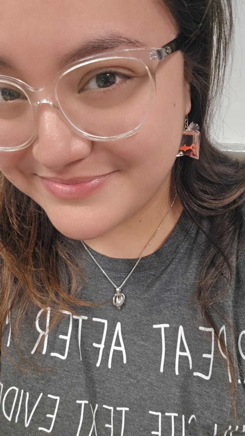 Customer photo review of Exaggerated Fair Fish Dangles Hypoallergenic Earrings for Sensitive Ears with Plastic Posts