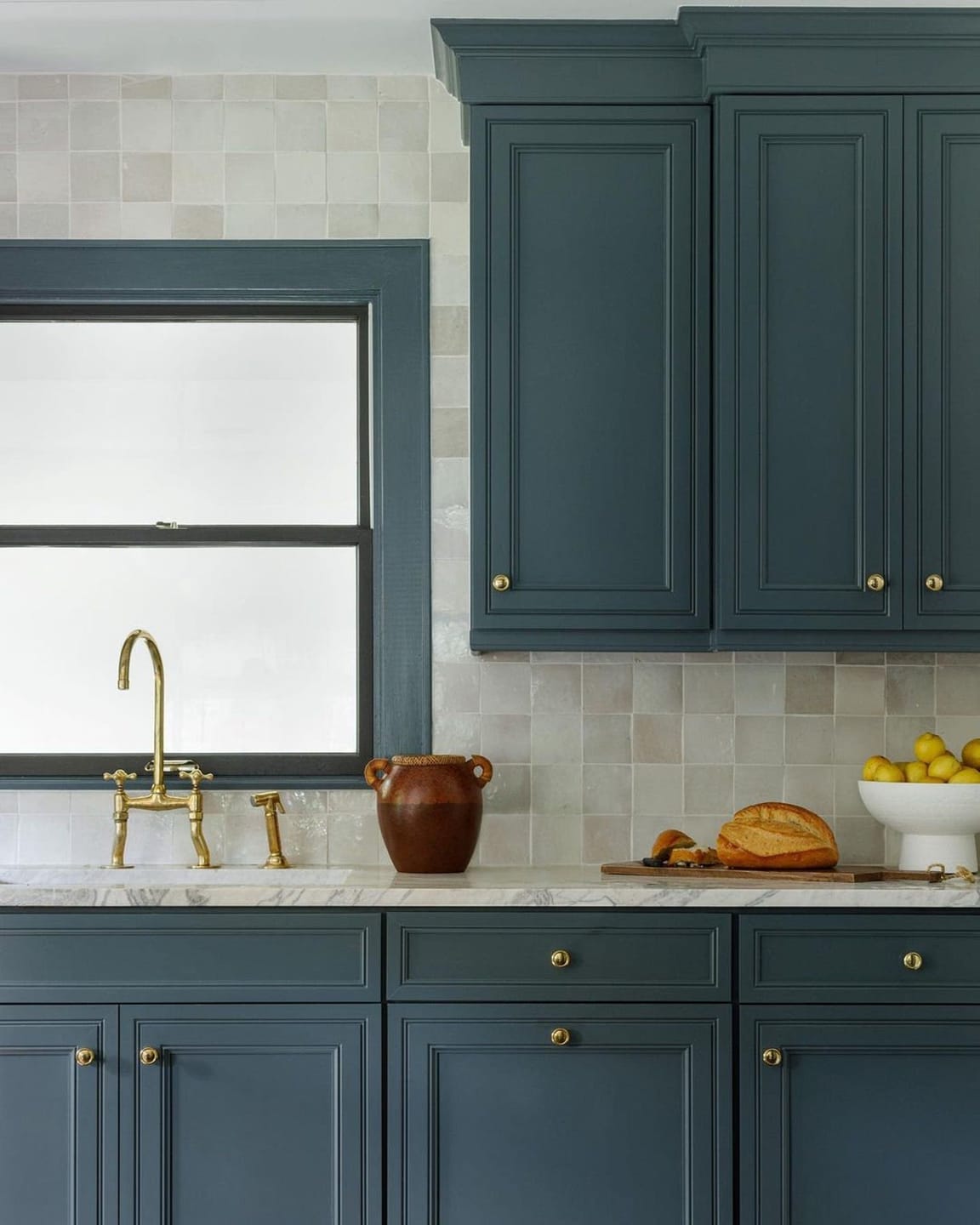 Customer photo review of Unlacquered Brass Kitchen faucet Curved Legs