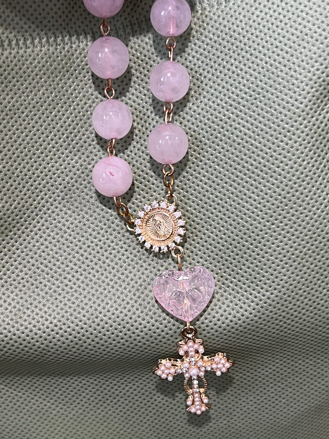 Customer photo review of SolaceBeads Artisan Rose Quartz Pocket Rosary: Soft Pink Beads with Sacred Cross & Marian Accents